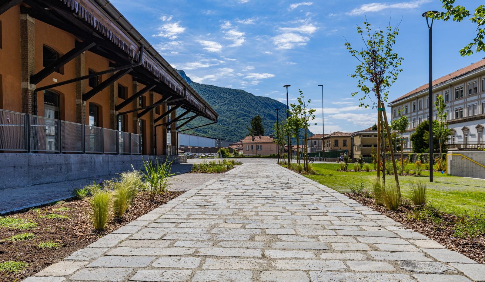 The reused stone path along the goods shed